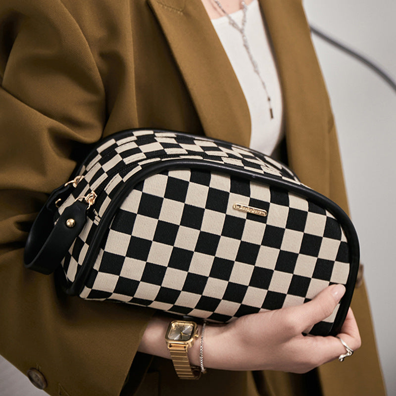 Iconic Checkerboard Half-Moon Cosmetic Case